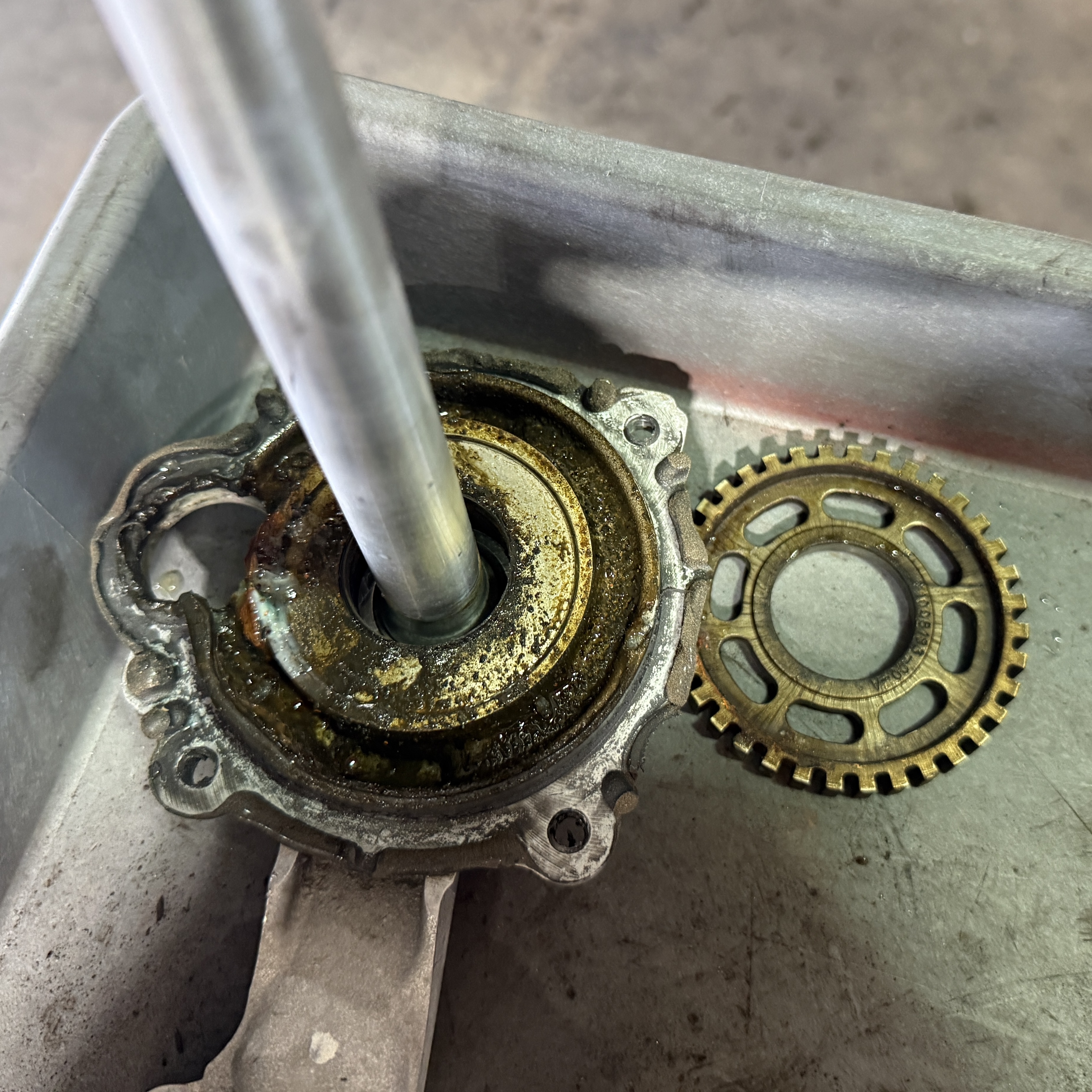 Tesla drive unit coolant seal detail showing failure point - Professional repair service in Dallas Fort Worth